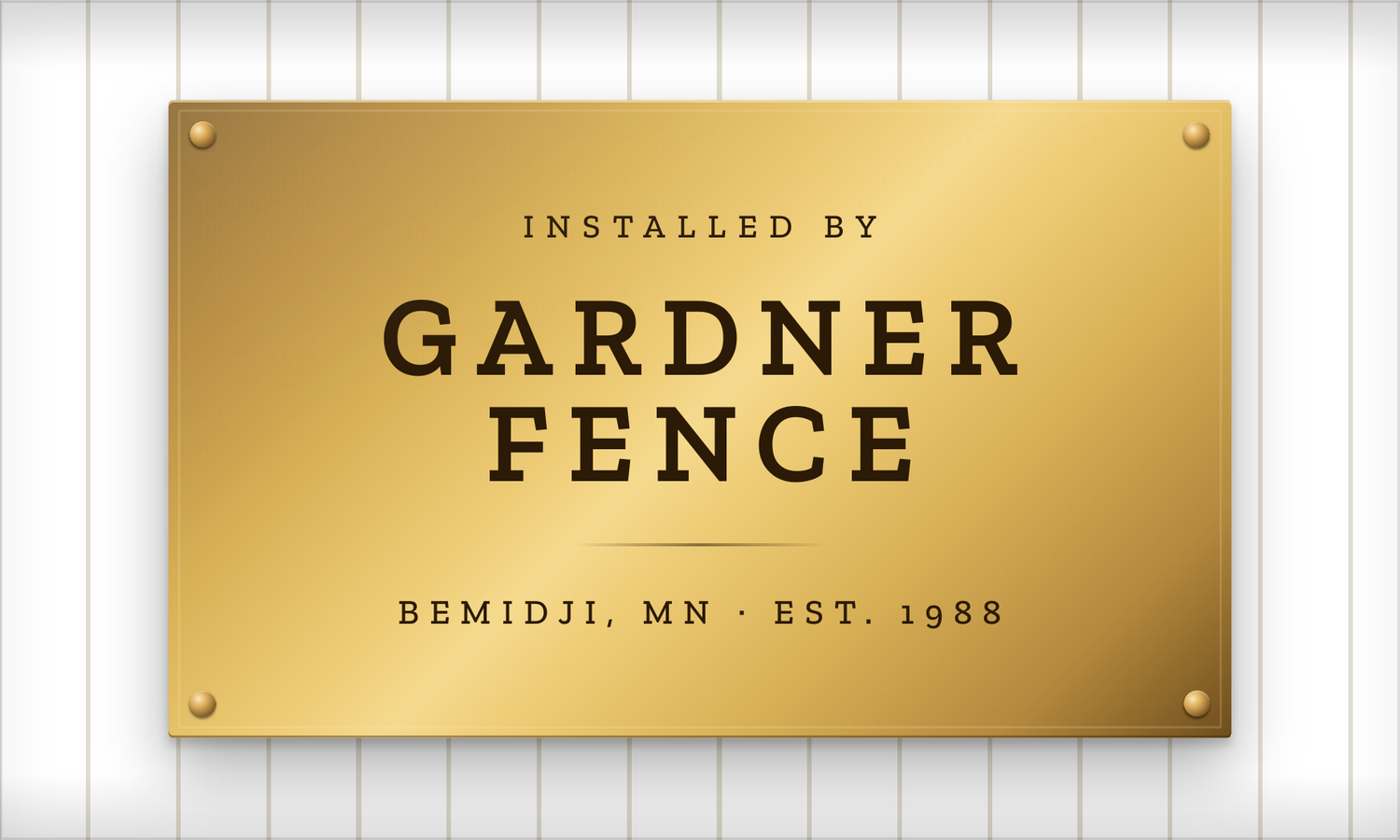 Gardner Fence cast metal gate plaque with the brand mark, mounted on an aluminum gate