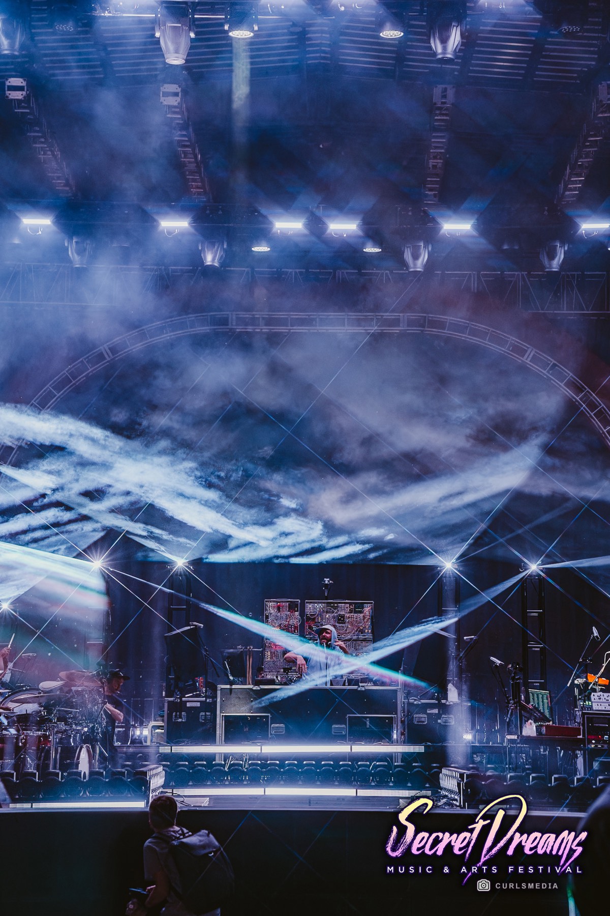 Festival stage set in the trees at night
